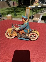 Unique art tin toy motorcycle cop wind up