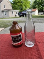 Norwalk bottle and black label