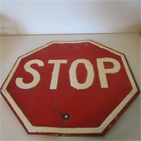 Vintage embossed Red steel stop sign.