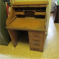 Small antique roll top desk.