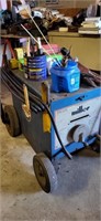 Miller M295p AC welder on cart