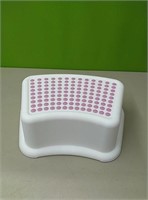 Small plastic step stool.....approx 14"×9"×5"