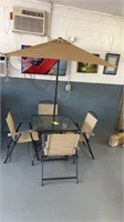Patio set new with umbrella table and 4 chairs
