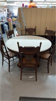 Chalk painted table with 6 wicker bottom chairs