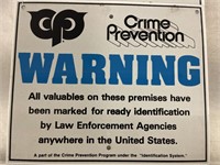 Pair of crime prevention warning signs each