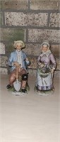 Two vintage homco porcelain farmer figurines