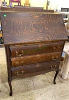 Antique tiger oak slant front desk with three