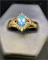 10k gold ring with topaz center stone