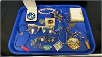 Mixed tray including necklaces, bracelets,