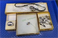 Four box jewelry lot including necklaces,