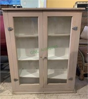 Antique two glass door wall cabinet with four