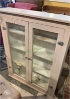 Antique two glass door wall cabinet with four