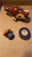 VINTAGE BULL TOY , SPIINING TOP ANS HOCKEY PUCK