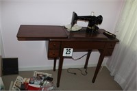 Singer Sewing Machine and Table16" x 34" x 30"