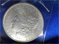 1887 A.U. Almost Uncirculated Shape Silver Dollar