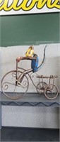 Custom built metal art monkey on a tricycle