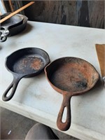 2- 5 1/2" cast iron skillets