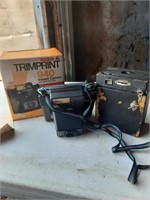 Kodak trim print 940 camera and old camera