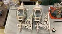Pair of metal and glass exterior lighting. Large
