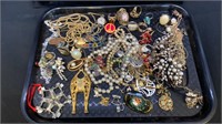 Tray lot with lots of costume jewelry, earrings,