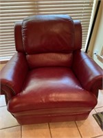 Red faux leather rocking recliner