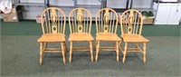 4 solid oak dining chairs