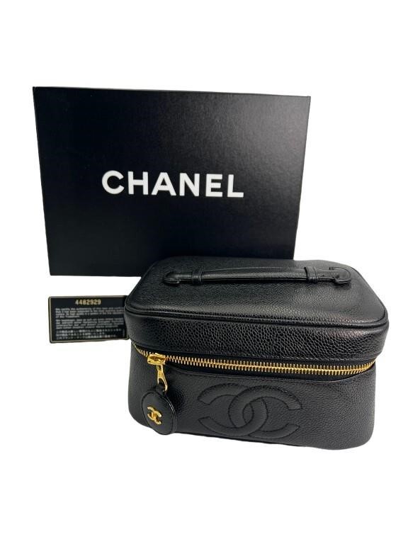 Leather Chanel Makeup Bag | Tom Hall Auctions, Inc