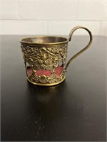 Antique brass piece glass holder