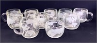 Set of 8 vintage Nestle "world map" glass mugs wit