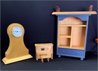Assorted miniature wooden items including a clock,