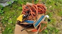 Box of extension cords and lights
