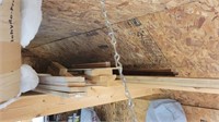Assorted wood pieces and insulation