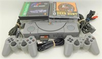 Sony PS1 with 2 Controllers, 1 Memory Card and 7