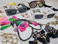 11 Costume Earrings. Necklaces and Sunglasses