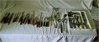 Large Assortment of Knives and Silverware
