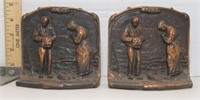 Pair of "Angelus" cast iron bookends w/bronze wash