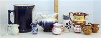 11 creamers or pitchers including 4 Copper Lustre