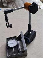 Magnetic base with dial indicator