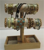 12" JEWELRY STAND FULL OF COSTUME BRACLETS &