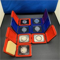 (7) RCM Dollar Collector Coins with Cases