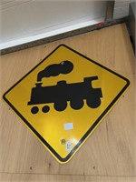 Train symbol crossing sign