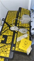 Yellow light up key boards and speaker set