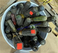 Bucket of assorted screwdrivers