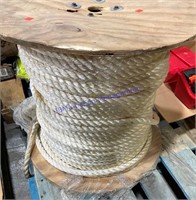 Large open spool of 3/4 inch poly plus rope