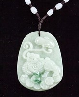 Chinese Greenstone Carved Lion Pendant with Cert