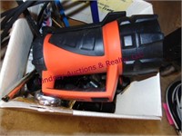Box with steel wool, hacksaws, rubber gloves