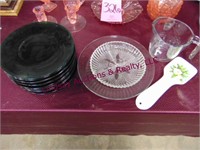 13 plates, measuring cup and spoon rest