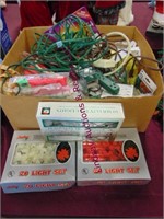3 new packages of Christmas lights and a large box