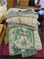 Group with bath rug and towels