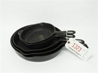 Lot #1323 - (5) Cast iron skillets in graduated
